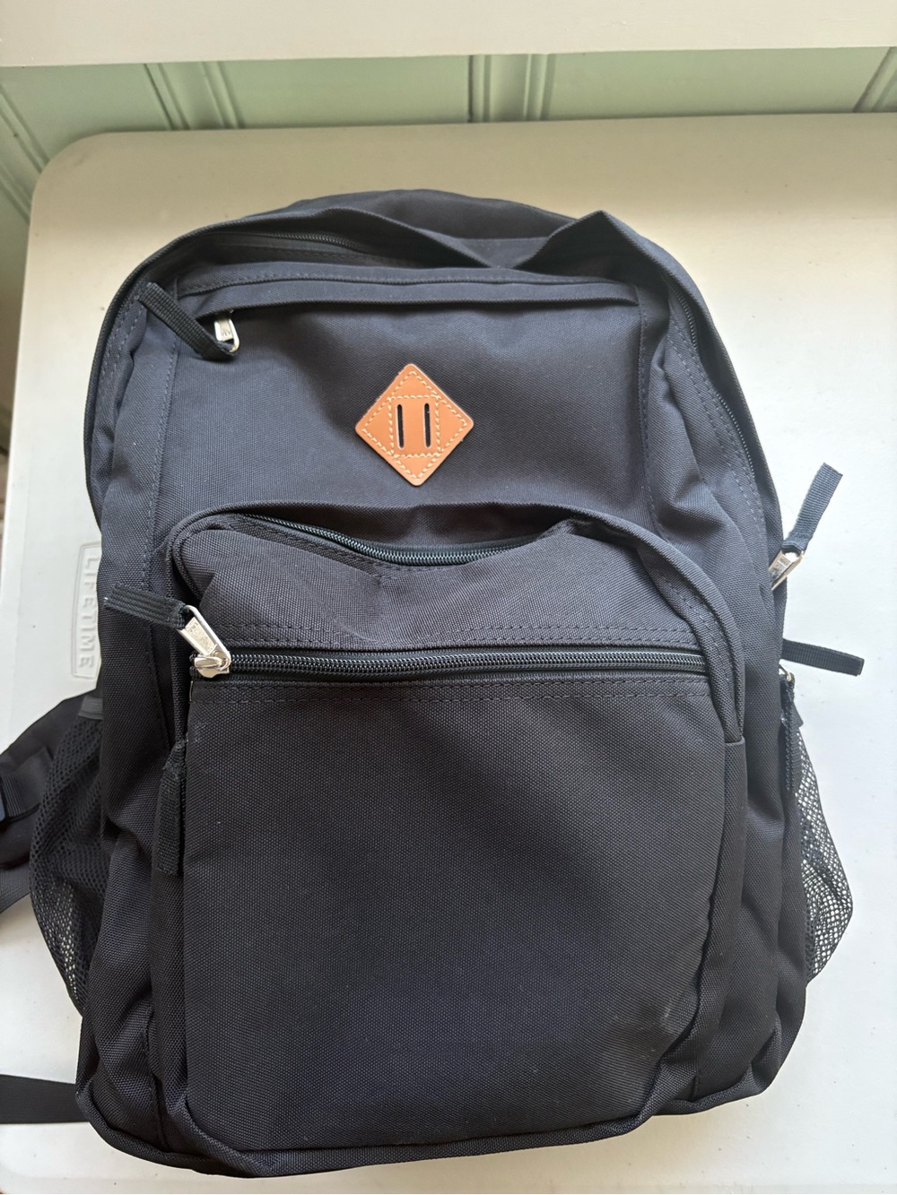 Classic Black Backpack with Leather Accent